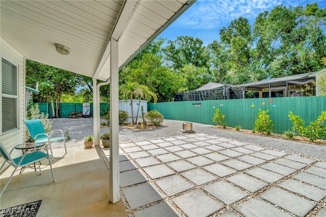 1308 Hull St S, Gulfport, FL 33707 - fenced backyard with a patio area