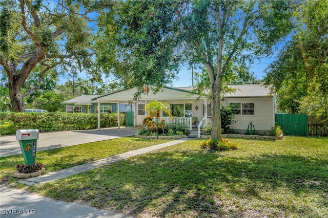 1308 Hull St S, Gulfport, FL 33707 - view of front facade featuring concrete driveway and a porch