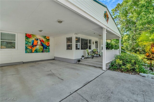 1308 Hull St S, Gulfport, FL 33707 - covered porch with a carport