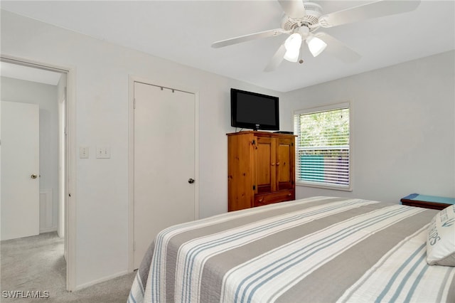 1308 Hull St S, Gulfport, FL 33707 - bedroom featuring carpet floors, a ceiling fan, and a closet