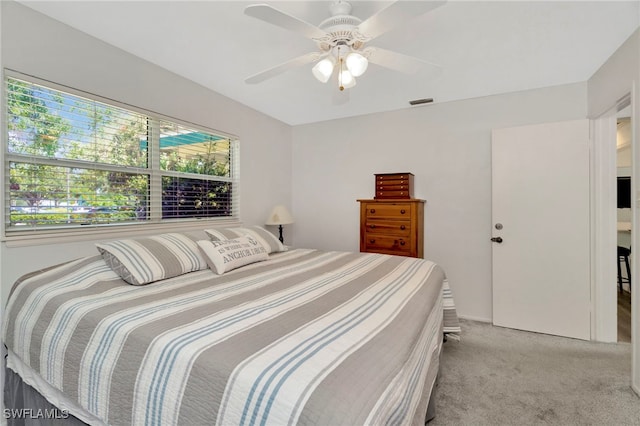 1308 Hull St S, Gulfport, FL 33707 - bedroom featuring light carpet and a ceiling fan
