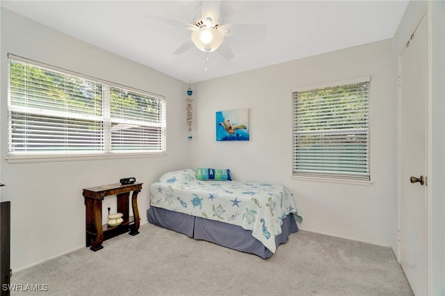 1308 Hull St S, Gulfport, FL 33707 - carpeted bedroom featuring ceiling fan