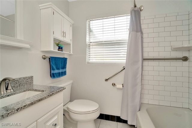 1308 Hull St S, Gulfport, FL 33707 - full bathroom featuring vanity, tile patterned flooring, and shower / tub combo with curtain