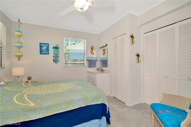 1308 Hull St S, Gulfport, FL 33707 - bedroom featuring light colored carpet, ornamental molding, and a ceiling fan