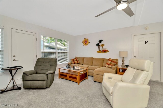 1308 Hull St S, Gulfport, FL 33707 - living area featuring carpet floors and a ceiling fan