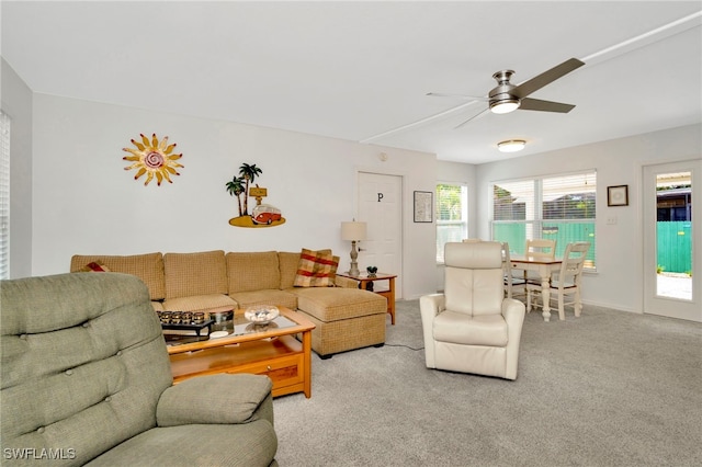 1308 Hull St S, Gulfport, FL 33707 - living room featuring ceiling fan and light colored carpet