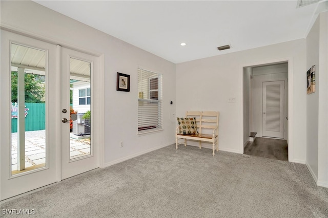 1308 Hull St S, Gulfport, FL 33707 - carpeted empty room with baseboards and recessed lighting