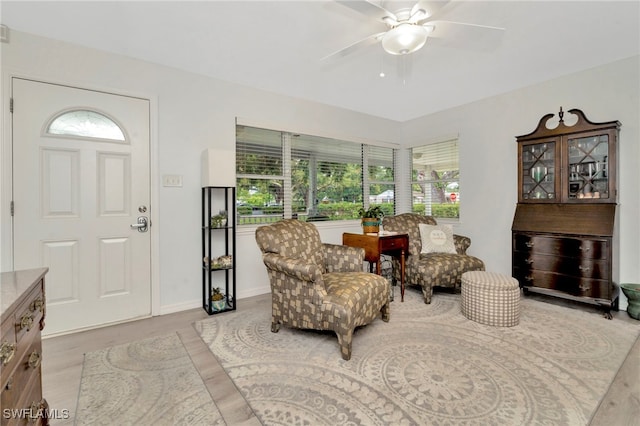 1308 Hull St S, Gulfport, FL 33707 - entrance foyer featuring healthy amount of natural light, ceiling fan, and light wood-style flooring