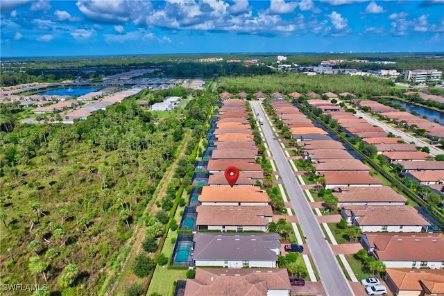 8142 Lucello Ter S, Naples, FL 34114 - aerial perspective of suburban area featuring a large body of water