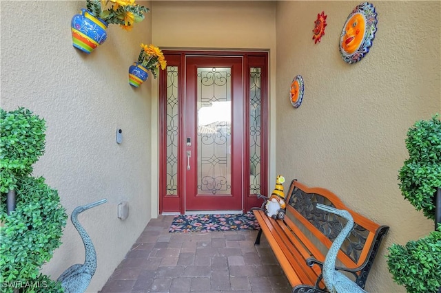 8142 Lucello Ter S, Naples, FL 34114 - doorway to property with stucco siding