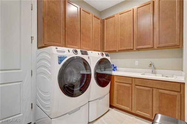 8142 Lucello Ter S, Naples, FL 34114 - laundry area featuring separate washer and dryer and cabinet space