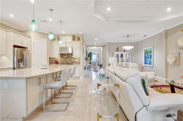 8142 Lucello Ter S, Naples, FL 34114 - living room featuring recessed lighting and crown molding