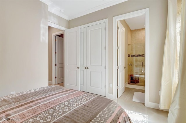 8142 Lucello Ter S, Naples, FL 34114 - bedroom featuring a closet, ensuite bathroom, and ornamental molding