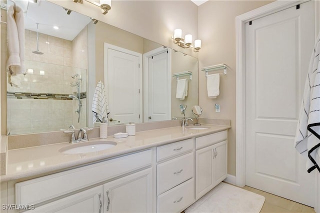 8142 Lucello Ter S, Naples, FL 34114 - full bath featuring a stall shower, double vanity, and tile patterned floors