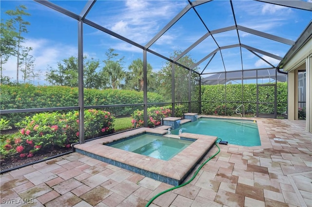 8142 Lucello Ter S, Naples, FL 34114 - outdoor pool featuring an in-ground hot tub, a patio area, and glass enclosure
