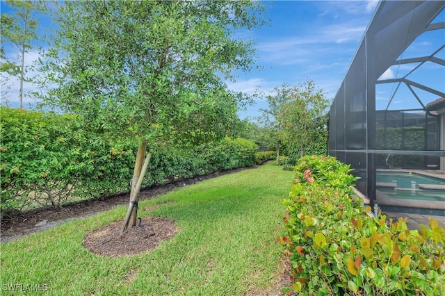 8142 Lucello Ter S, Naples, FL 34114 - view of grassy yard featuring glass enclosure and a pool with connected hot tub