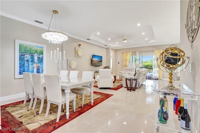 8142 Lucello Ter S, Naples, FL 34114 - dining area featuring crown molding, recessed lighting, a raised ceiling, a chandelier, and a ceiling fan