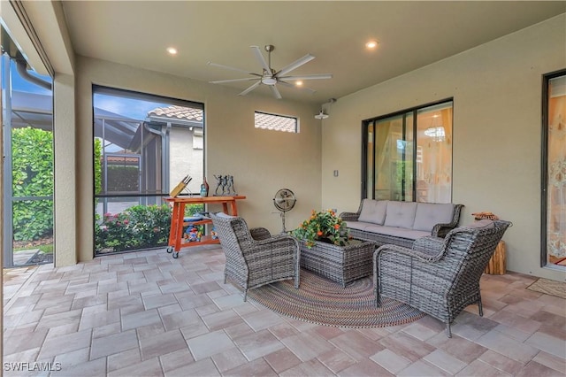 8142 Lucello Ter S, Naples, FL 34114 - view of patio featuring ceiling fan, an outdoor living space, and glass enclosure