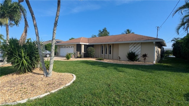 169 SE 21st St, Cape Coral, FL 33990 - single story home with stucco siding, a garage, concrete driveway, and a front lawn