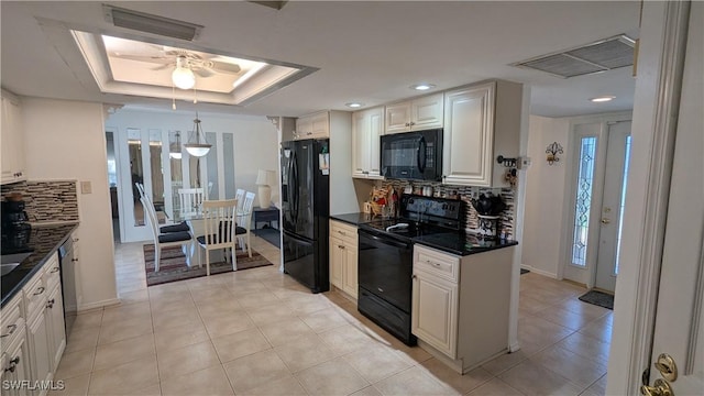 169 SE 21st St, Cape Coral, FL 33990 - kitchen with black appliances, dark countertops, decorative backsplash, a ceiling fan, and light tile patterned floors