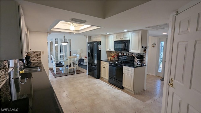 169 SE 21st St, Cape Coral, FL 33990 - kitchen with black appliances, tasteful backsplash, dark countertops, a ceiling fan, and light tile patterned floors
