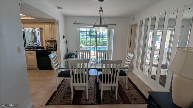 169 SE 21st St, Cape Coral, FL 33990 - dining room with light tile patterned flooring
