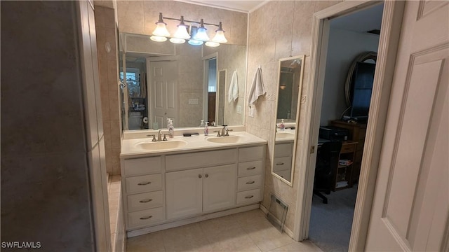 169 SE 21st St, Cape Coral, FL 33990 - full bathroom featuring double vanity and tile patterned flooring