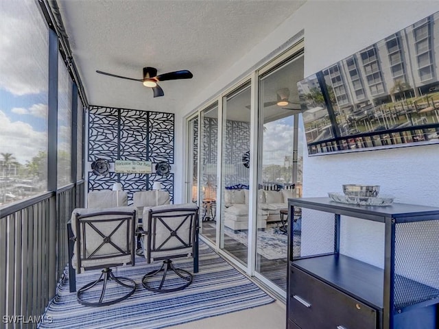 4431 Bay Beach Ln Unit 522, Fort Myers Beach, FL 33931 - sunroom / solarium with ceiling fan and plenty of natural light