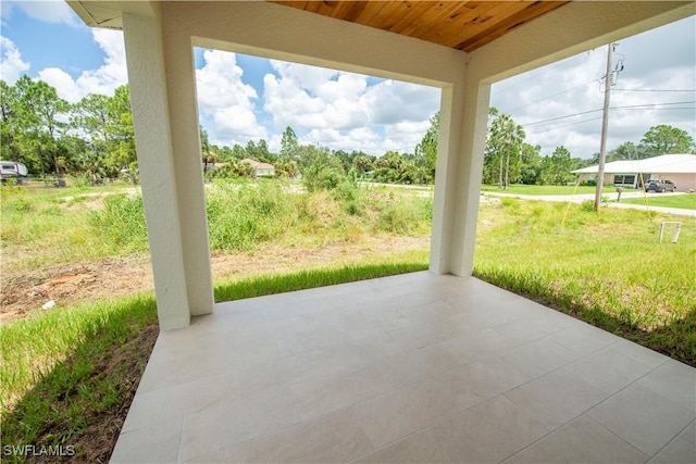 3407 E 5th St, Lehigh Acres, FL 33972 - view of patio with view of wooded area