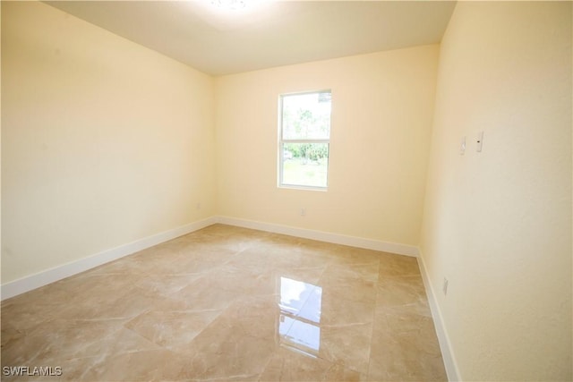 3407 E 5th St, Lehigh Acres, FL 33972 - unfurnished room featuring baseboards
