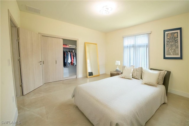 3407 E 5th St, Lehigh Acres, FL 33972 - bedroom with baseboards and a closet