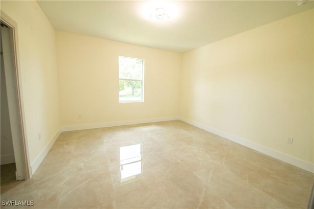 3407 E 5th St, Lehigh Acres, FL 33972 - empty room featuring baseboards
