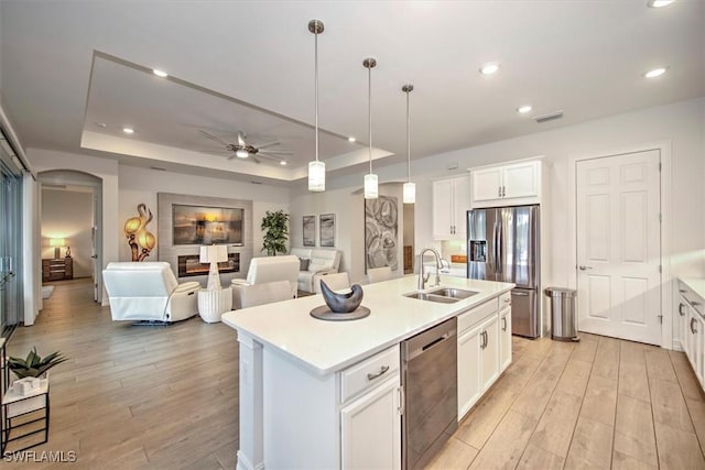 3649 Avenida Del Vera, North Fort Myers, FL 33917 - kitchen with stainless steel appliances, light countertops, light wood-style flooring, open floor plan, and recessed lighting