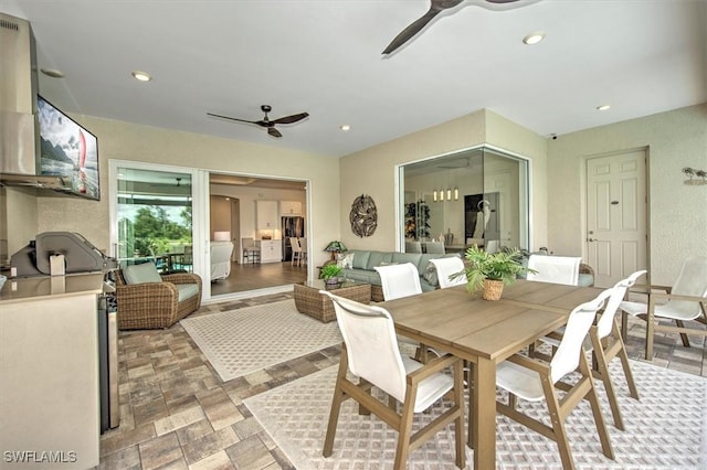 3649 Avenida Del Vera, North Fort Myers, FL 33917 - view of patio / terrace with ceiling fan, exterior kitchen, and outdoor dining area