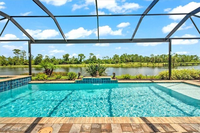3649 Avenida Del Vera, North Fort Myers, FL 33917 - view of pool with a water view, a lanai, view of wooded area, and a pool with connected hot tub