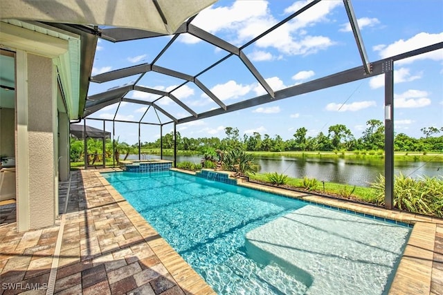 3649 Avenida Del Vera, North Fort Myers, FL 33917 - view of pool with a patio area, a water view, a pool with connected hot tub, and a lanai