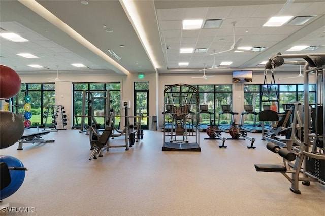 580 El Camino Real Unit 3606, Naples, FL 34119 - gym featuring a paneled ceiling