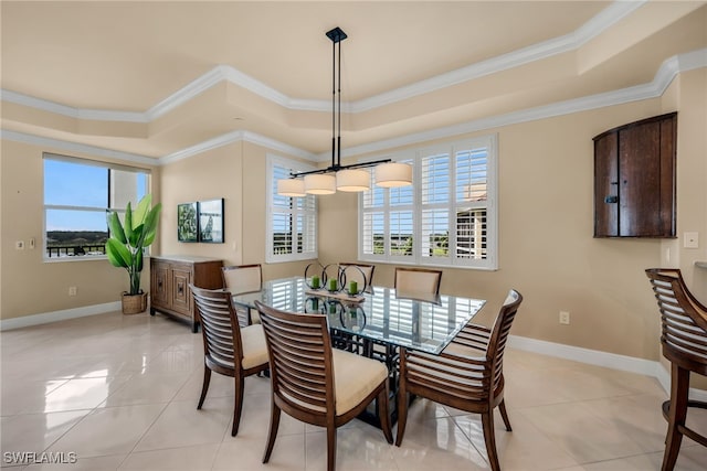 580 El Camino Real Unit 3606, Naples, FL 34119 - dining area featuring a raised ceiling, crown molding, and light tile patterned floors