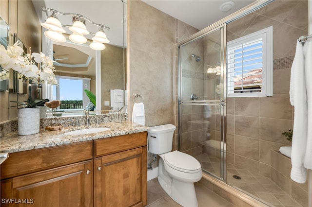 580 El Camino Real Unit 3606, Naples, FL 34119 - full bathroom with plenty of natural light, vanity, a stall shower, and tile patterned floors