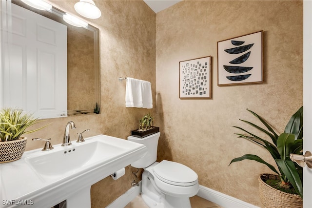 580 El Camino Real Unit 3606, Naples, FL 34119 - bathroom featuring a sink and toilet