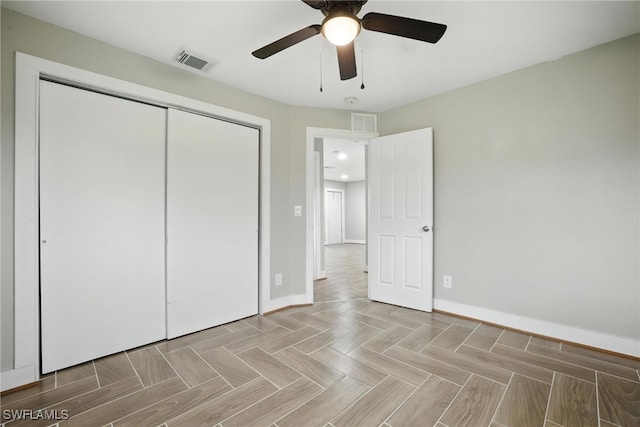125/127 Gordon Ave S, Lehigh Acres, FL 33973 - unfurnished bedroom featuring a closet and ceiling fan