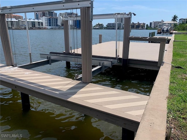 432 Oak Ave, Naples, FL 34108 - dock with boat lift, a water view, and a view of city