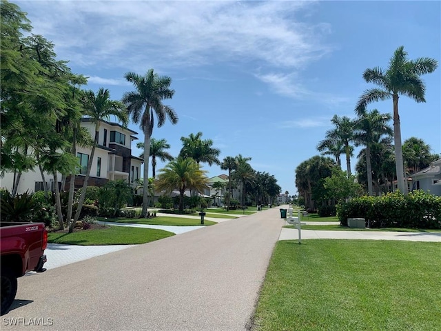 432 Oak Ave, Naples, FL 34108 - view of asphalt road with a residential view