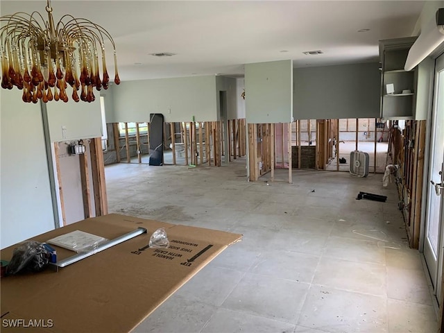 432 Oak Ave, Naples, FL 34108 - misc room with a chandelier