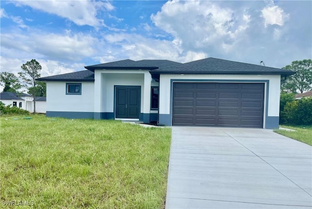 3307 18th St SW, Lehigh Acres, FL 33976 - view of front of house featuring concrete driveway, stucco siding, and a garage