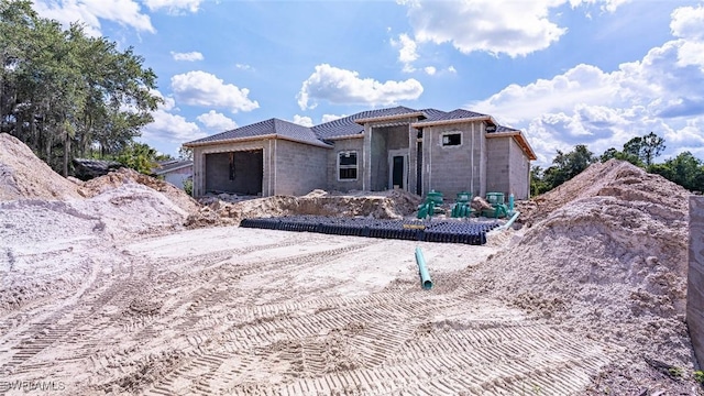 615 8th Ave, Lehigh Acres, FL 33972 - property in mid-construction with a garage