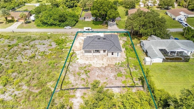 615 8th Ave, Lehigh Acres, FL 33972 - aerial view of residential area featuring property parcel outlined