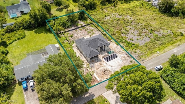 615 8th Ave, Lehigh Acres, FL 33972 - aerial overview of property's location with property boundaries highlighted