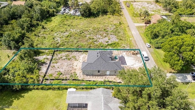 615 8th Ave, Lehigh Acres, FL 33972 - aerial view of property and surrounding area with property parcel outlined