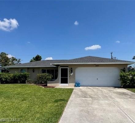 1427 SE 22nd St, Cape Coral, FL 33990 - single story home featuring an attached garage, driveway, a front lawn, and stucco siding